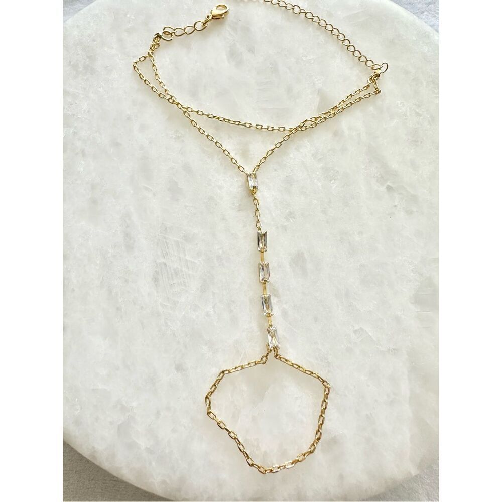 Cubic zirconia elongated radiant cut gold finger chain link bracelet ￼